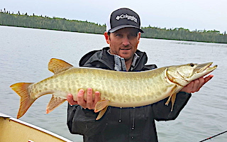 BIG FAT Muskie Fishing at Fireside Lodge in Ontario Canada by Josh